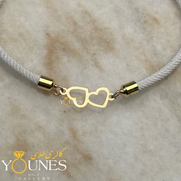 دستبند دو قلب توخالی طلا لیزری